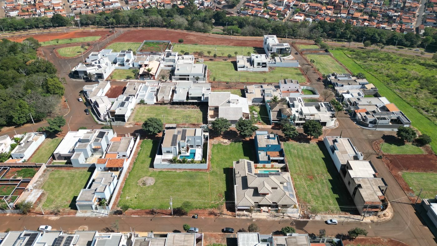Vista aérea do loteamento Cidade Nova mostrando ruas, lotes e casas construídas